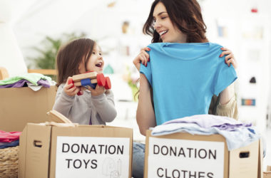 donation-boxes-with-woman,-girl-volunteers